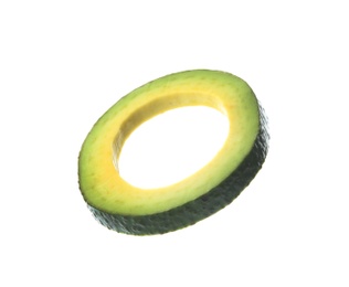 Photo of Slice of ripe avocado on white background