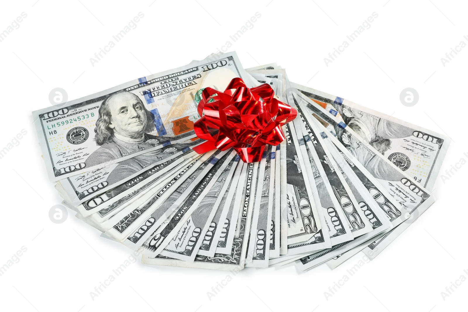 Photo of Fan of dollar banknotes with bow on white background