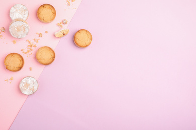 Photo of Delicious cookies on color background, flat lay. Space for text