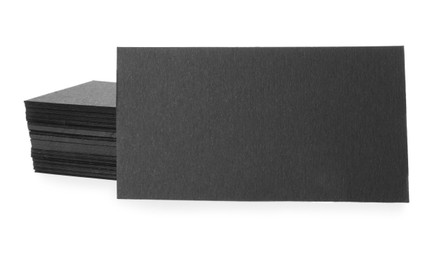 Photo of Many blank black business cards isolated on white. Mockup for design