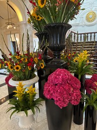 Photo of Amsterdam, Netherlands - September 23, 2023: Vases with beautiful flowers in Amstel Hotel