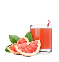 Glass of grapefruit juice, fresh fruit and green leaves on white background