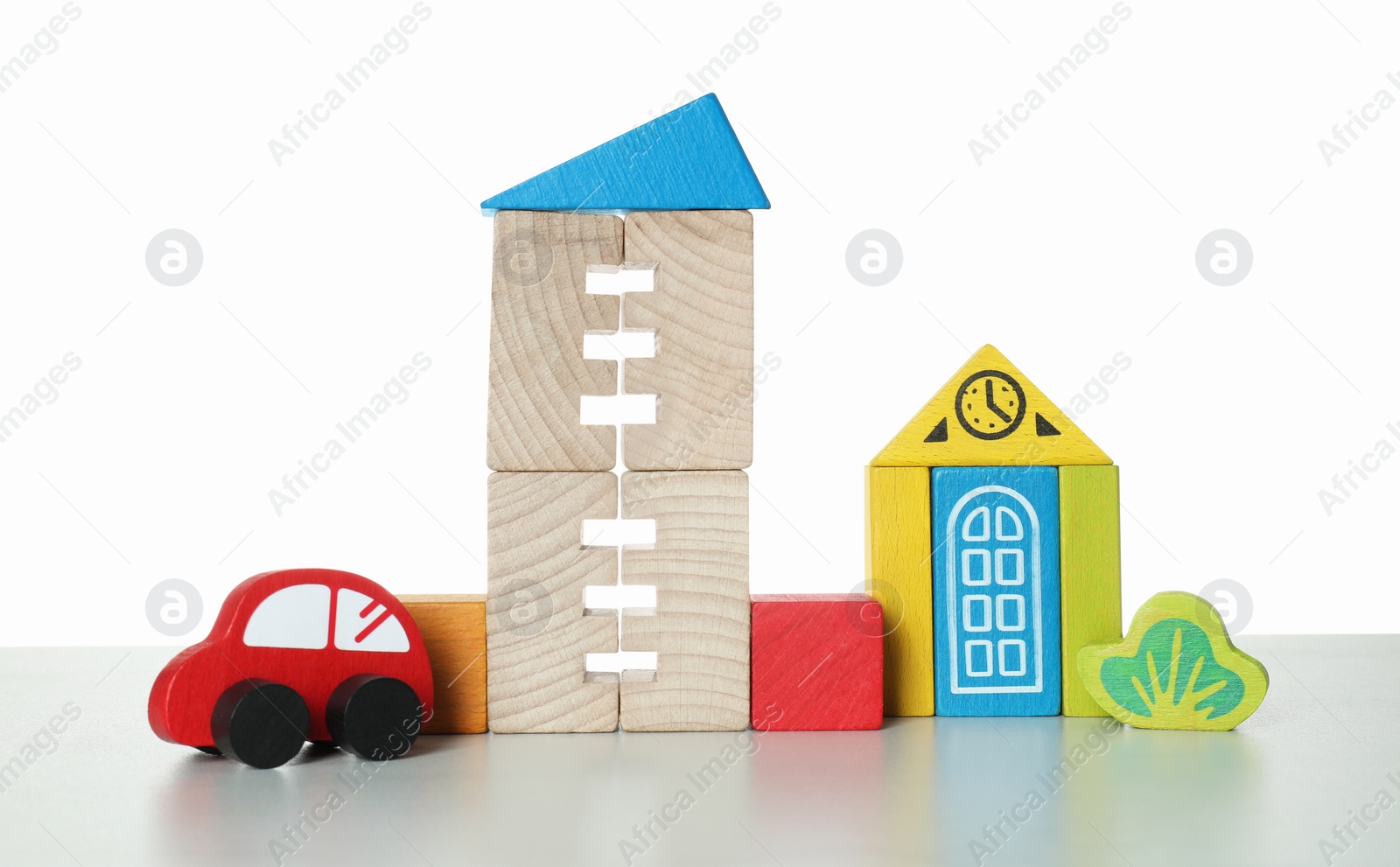 Photo of Different wooden toys isolated on white. Children's development