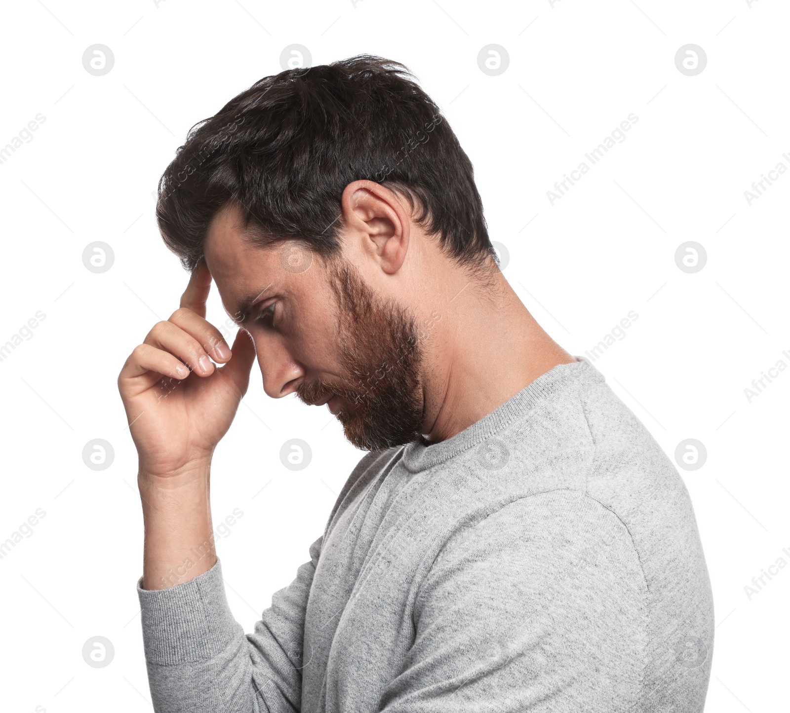 Photo of Bearded man putting head on white background