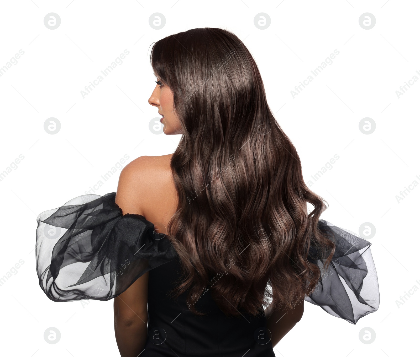 Image of Woman with shiny wavy hair on white background. Professional hairstyling