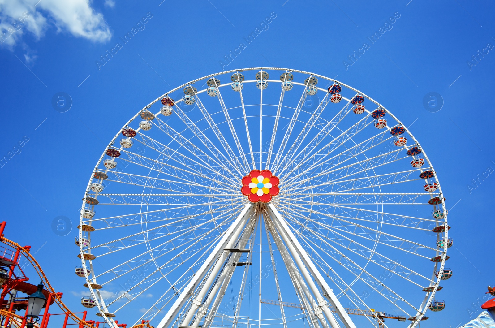 Photo of VIENNA, AUSTRIA - JUNE 18, 2018: Grand Ferris Wheel in amusement park on sunny day