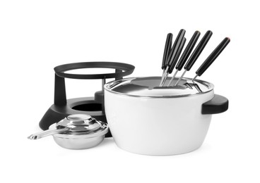 Fondue set isolated on white. Kitchen equipment