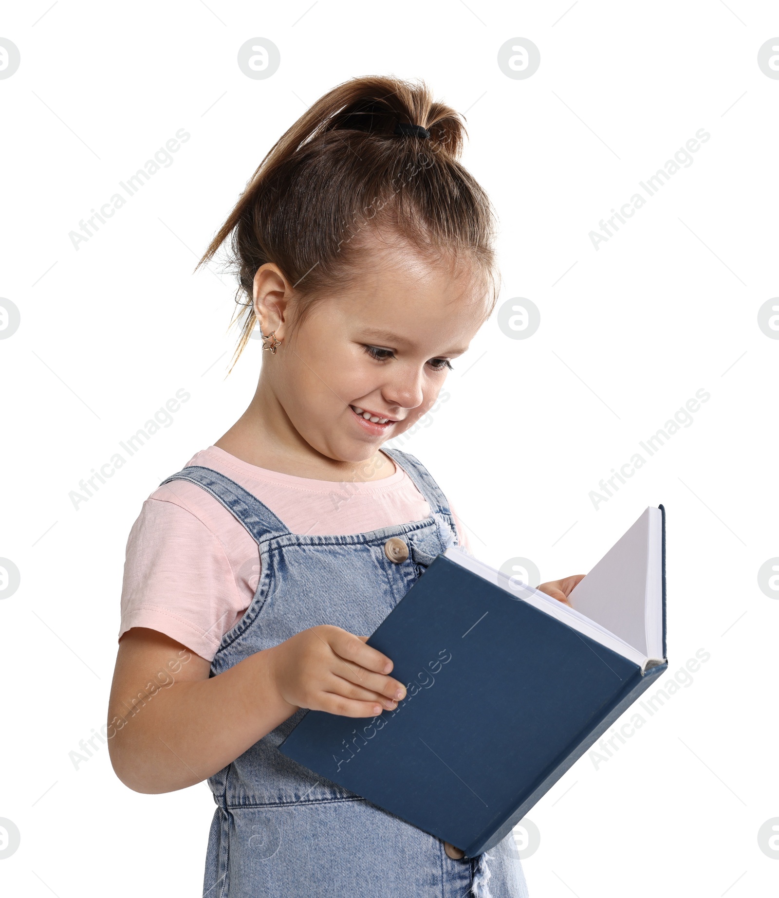 Photo of Cute little girl reading book on white background