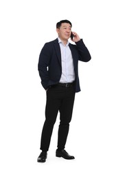 Photo of Businessman in suit talking on phone against white background