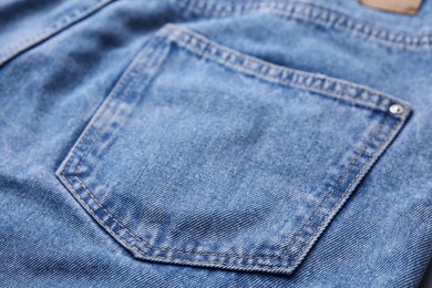 Photo of Jeans with pocket as background, closeup view