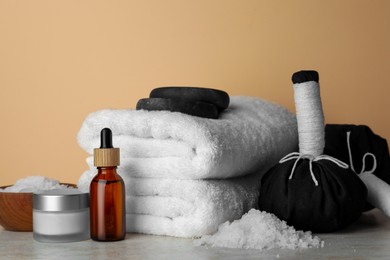 Photo of Composition with different spa products on beige table