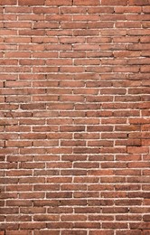 Photo of Texture of old red brick wall as background