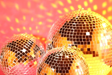 Many shiny disco balls indoors, color toned