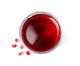 Photo of Fresh pomegranate juice in glass and seeds on white background, top view