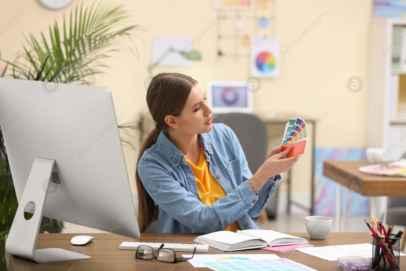 Photo of Professional interior designer at workplace in office