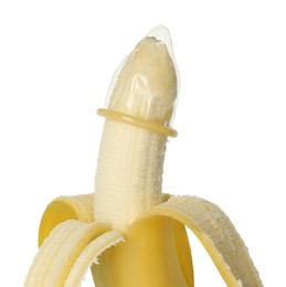 Photo of Banana with condom isolated on white. Safe sex concept