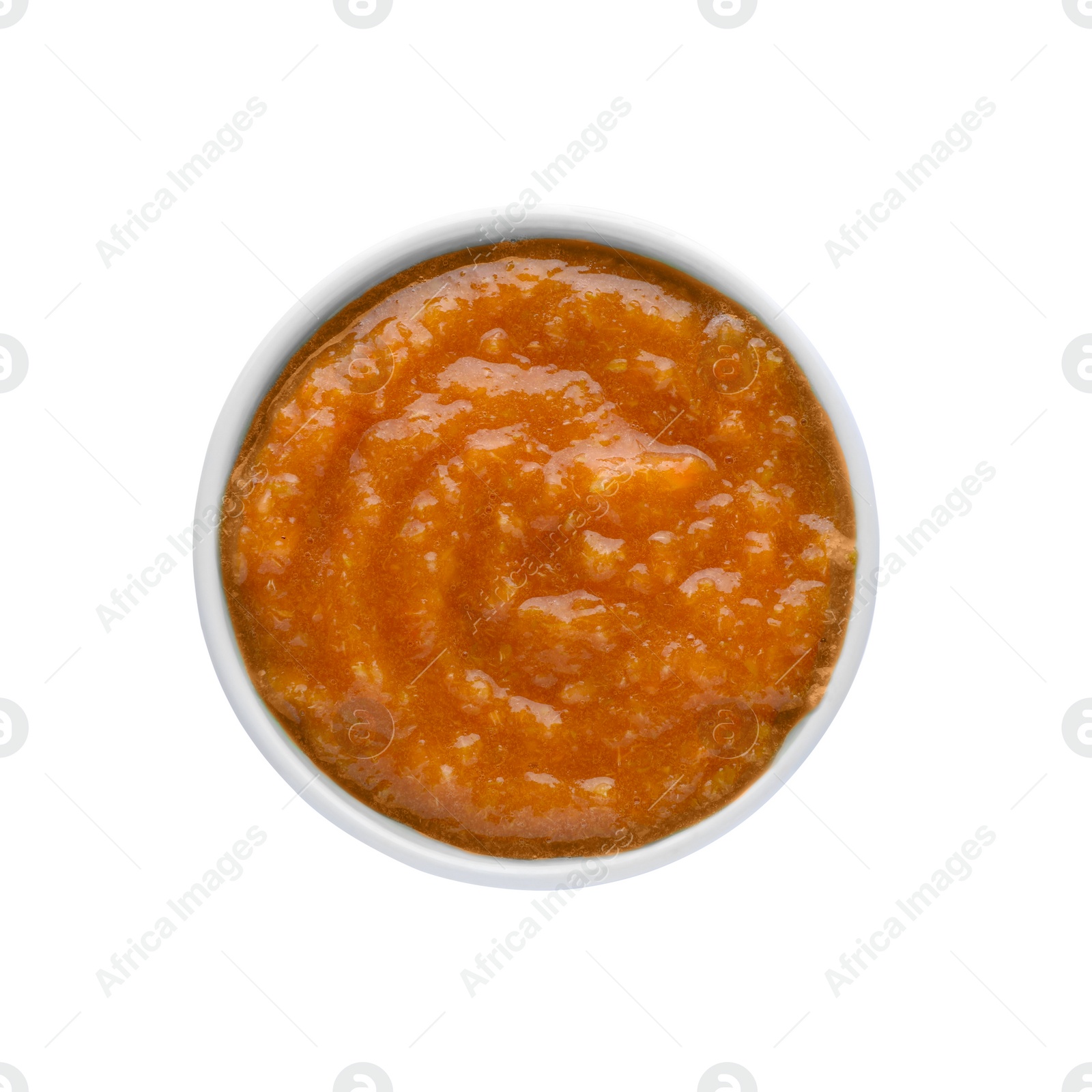 Photo of Fruit puree in bowl isolated on white, top view