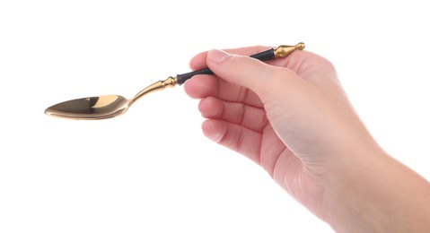 Photo of Woman holding elegant golden spoon on white background, closeup