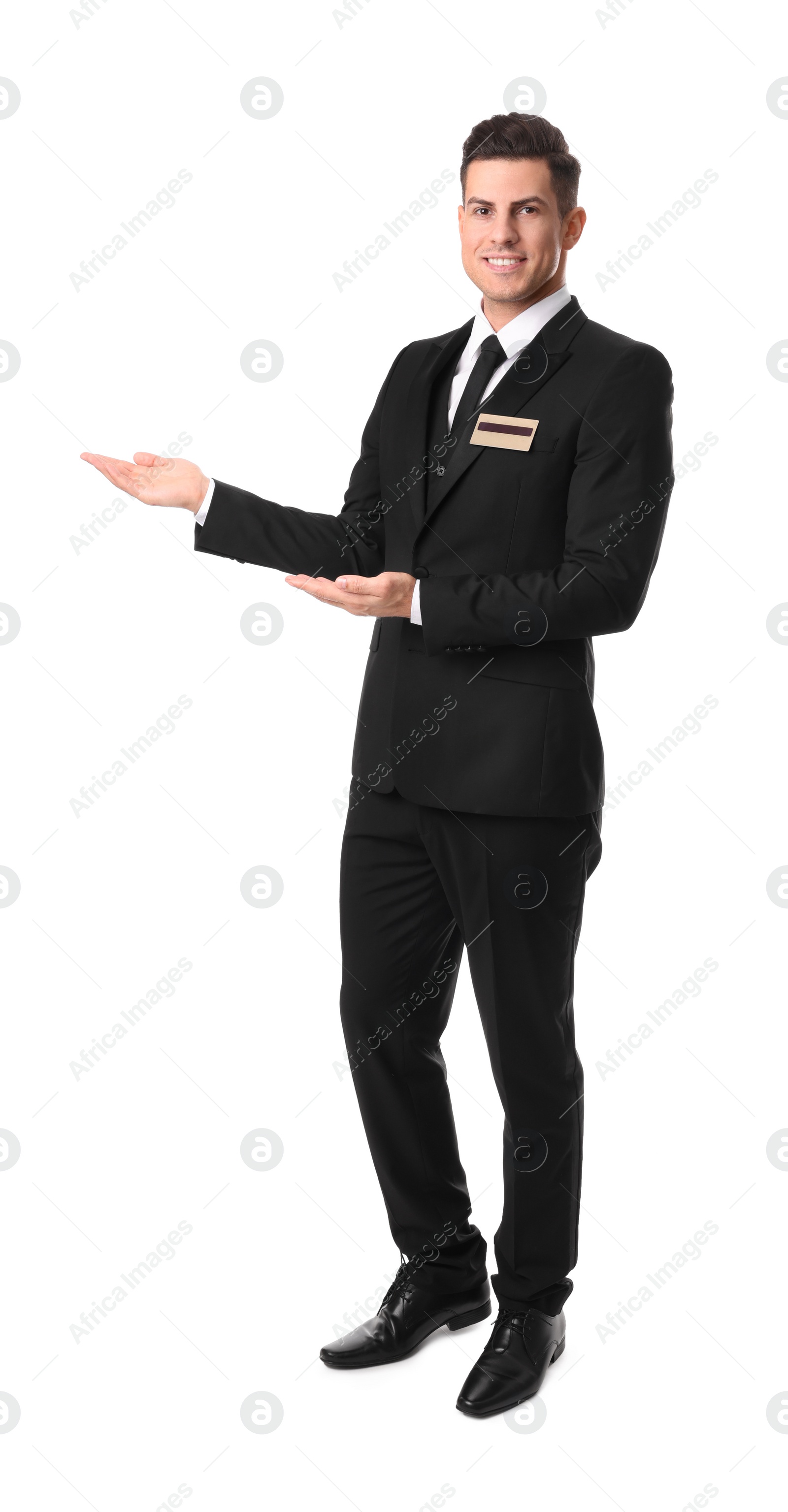 Photo of Full length portrait of happy receptionist in uniform on white background