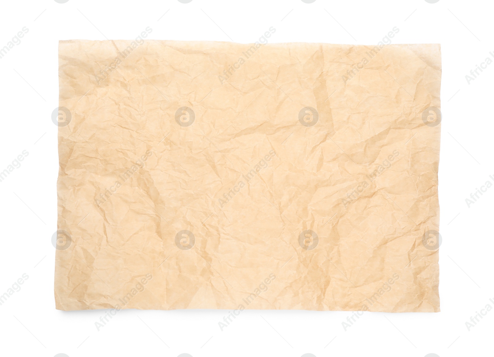 Photo of Sheet of crumpled brown baking paper on white background, top view