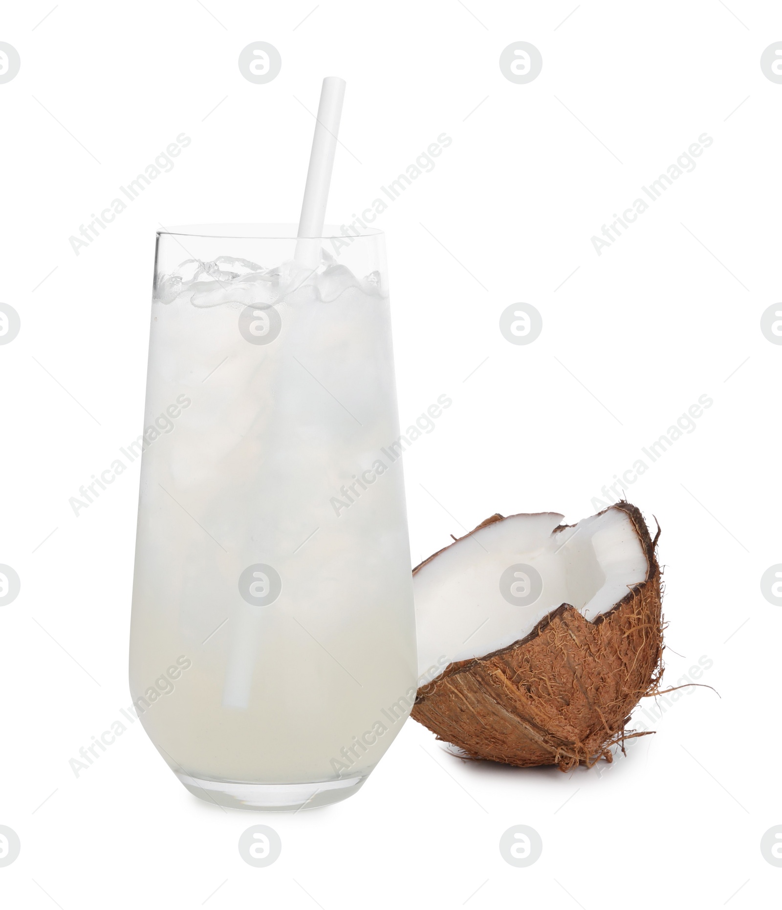 Photo of Glass of coconut water, ice cubes and nut isolated on white