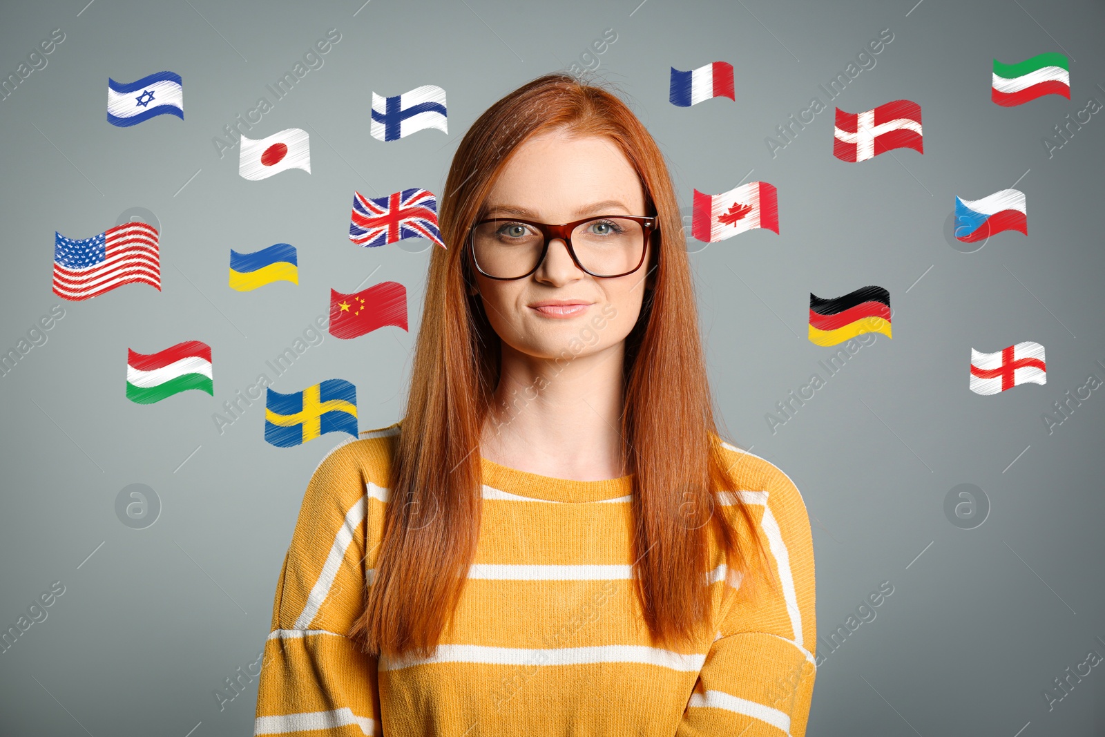 Image of Portrait of interpreter and flags of different countries on grey background