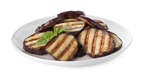Photo of Delicious grilled eggplant slices with basil isolated on white