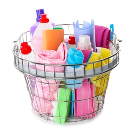 Metal shopping basket with different household chemicals on white background