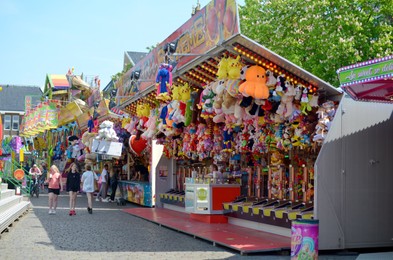 Netherlands, Groningen - May 18, 2022: Stall of many prize winning soft toys in amusement park