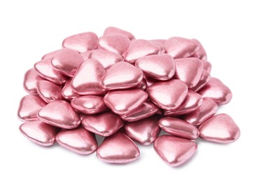 Photo of Pile of heart shaped candies on white background