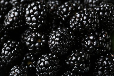 Pile of tasty ripe blackberries as background, closeup