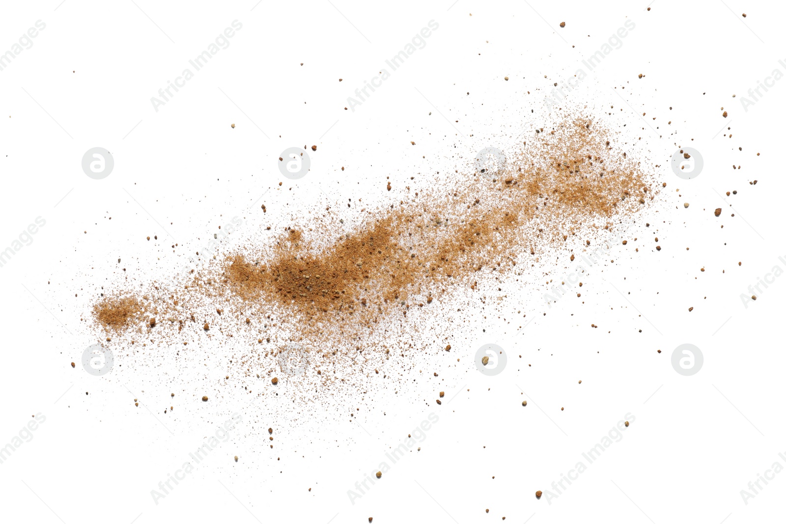 Photo of Pile of brown dust scattered on white background, top view