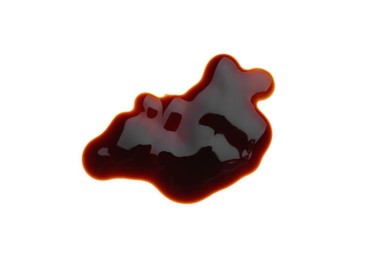 Puddle of soy sauce on white background, top view