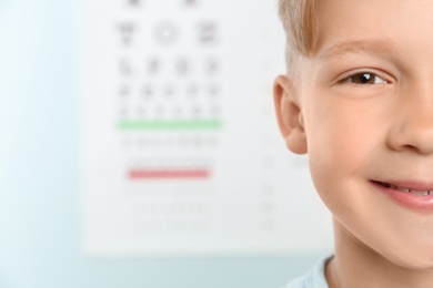 Cute little boy in ophthalmologist office. Focus on face