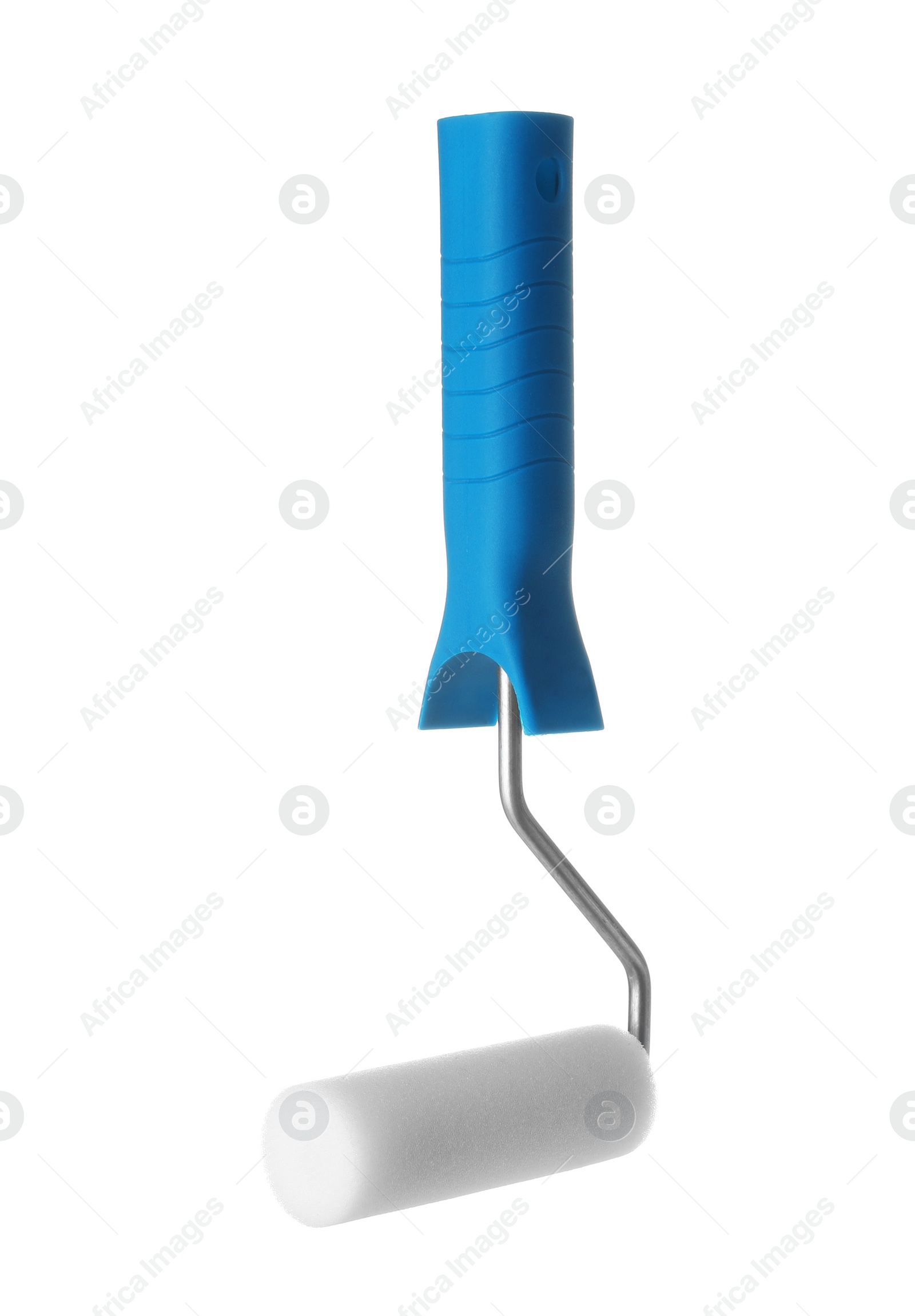 Photo of New paint roller brush on white background