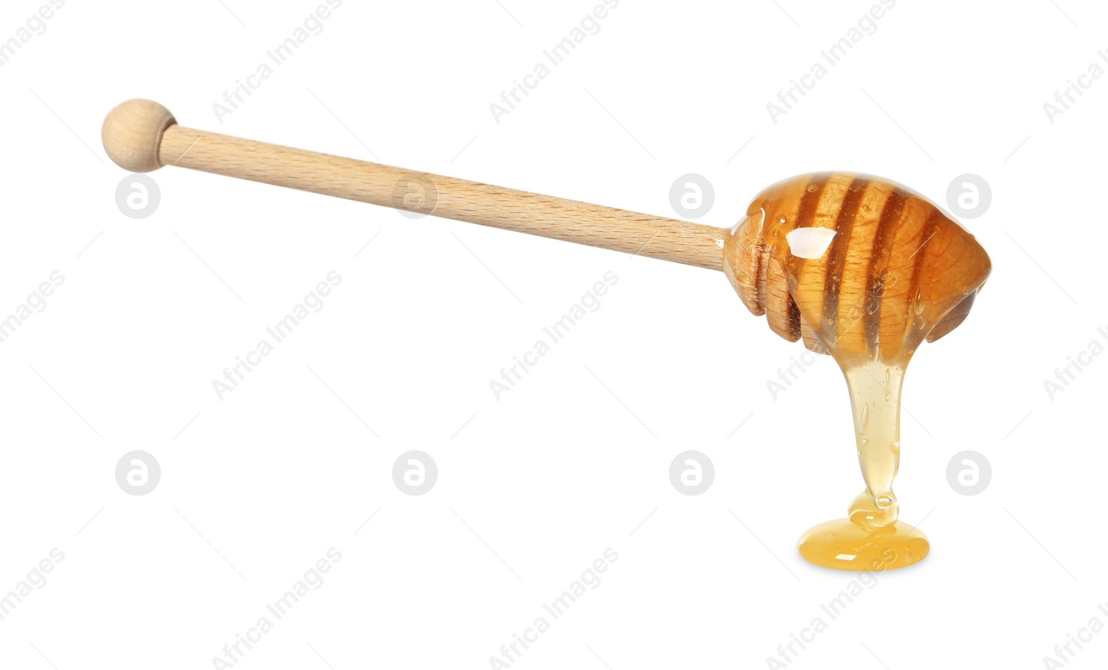 Photo of Natural honey dripping from dipper on white background