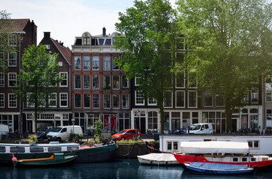 Picturesque view of town with beautiful buildings near river