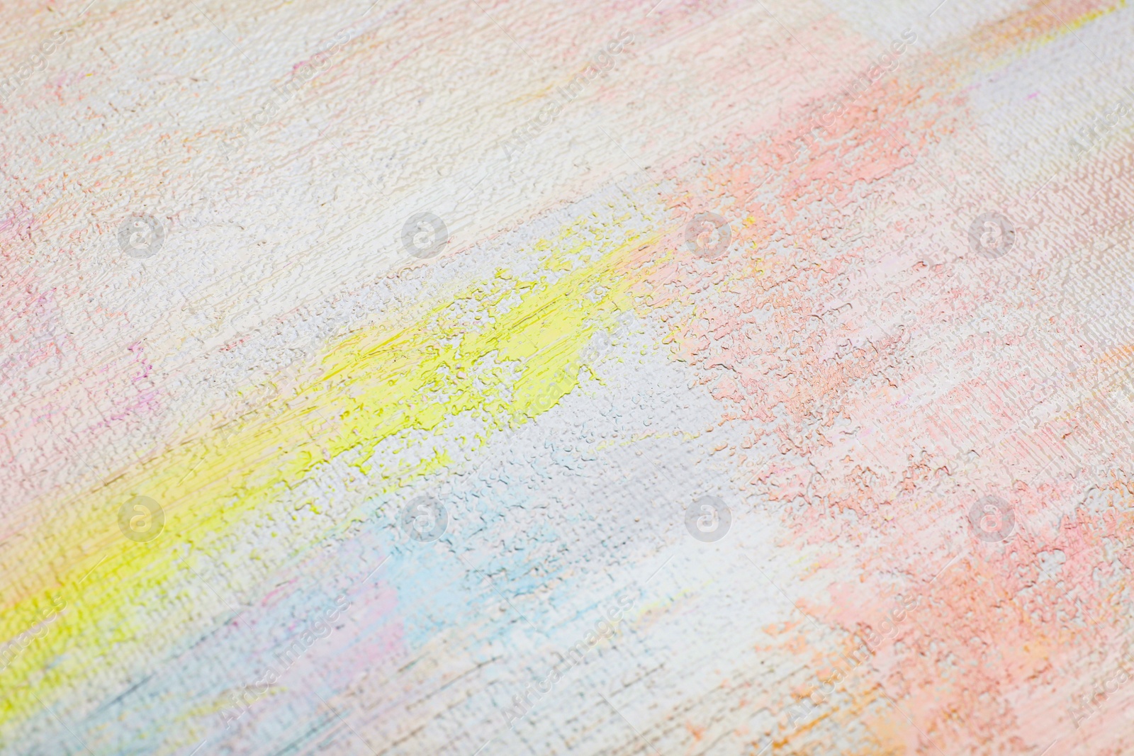 Photo of Strokes of different pastel acrylic paints on white canvas, closeup