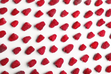 Photo of Composition with delicious ripe raspberries on white background, top view