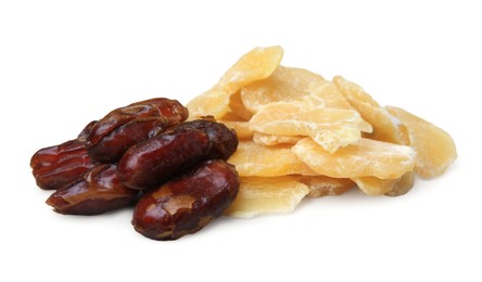 Photo of Pile of tasty dried pineapple and dates on white background. Healthy snack
