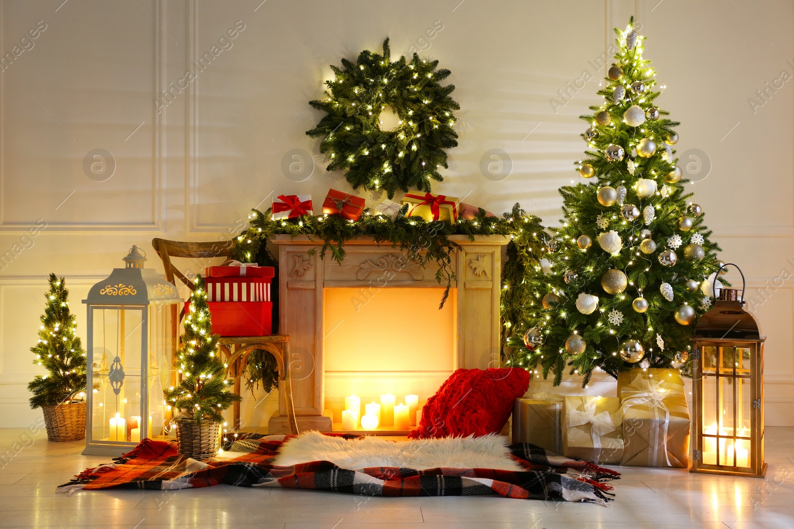 Photo of Beautiful Christmas themed photo zone with fireplace and fir decor