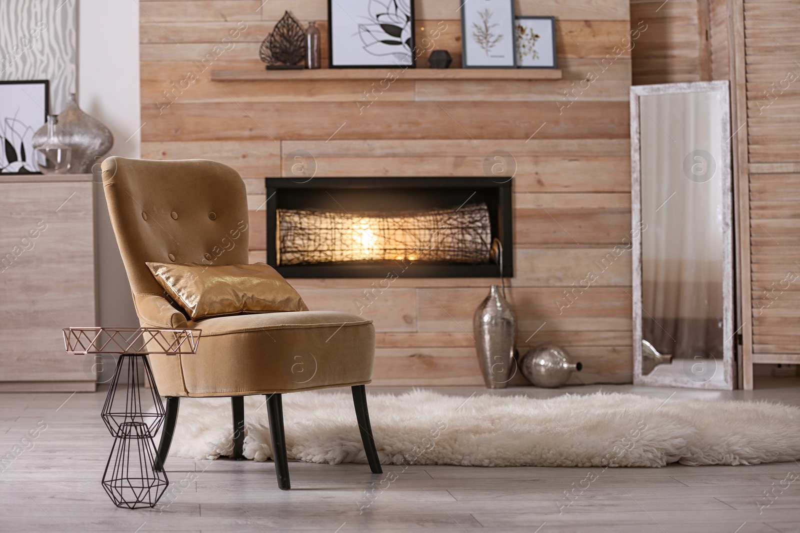 Photo of Cozy living room interior with comfortable chair and decorative fireplace