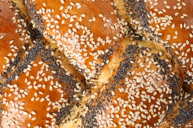 Photo of Sweet plaited challah as background, closeup. Fresh bread