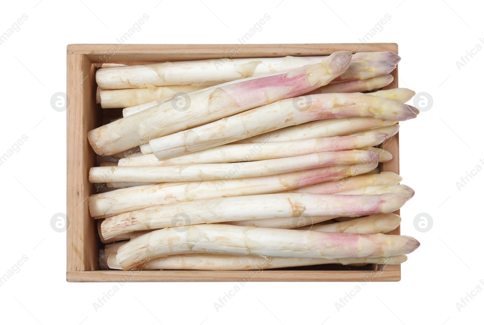 Photo of Fresh ripe asparagus in wooden crate isolated on white, top view