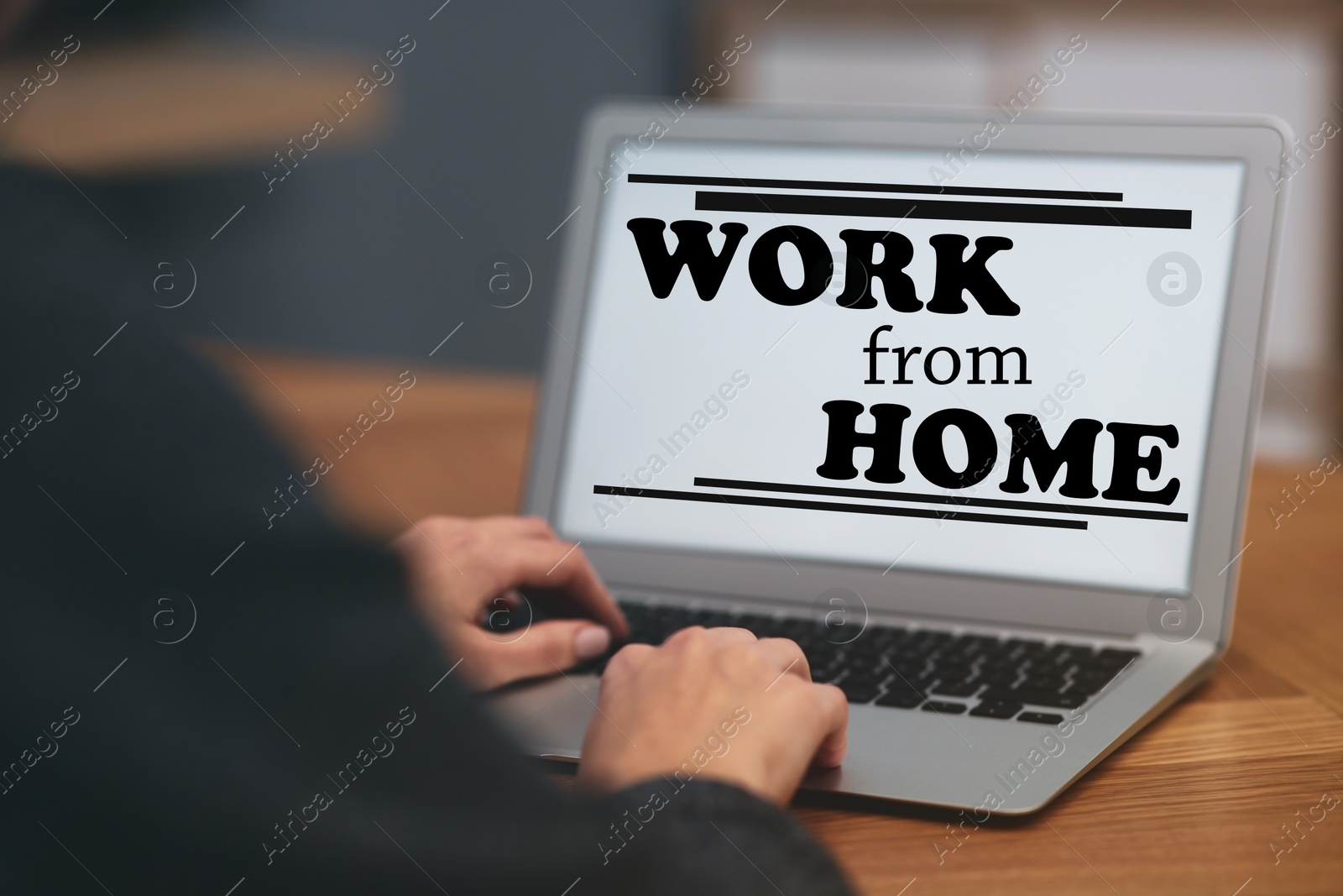 Image of Woman using modern laptop at table, closeup. Work from home
