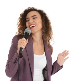 Photo of Curly African-American woman in suit singing with microphone on white background