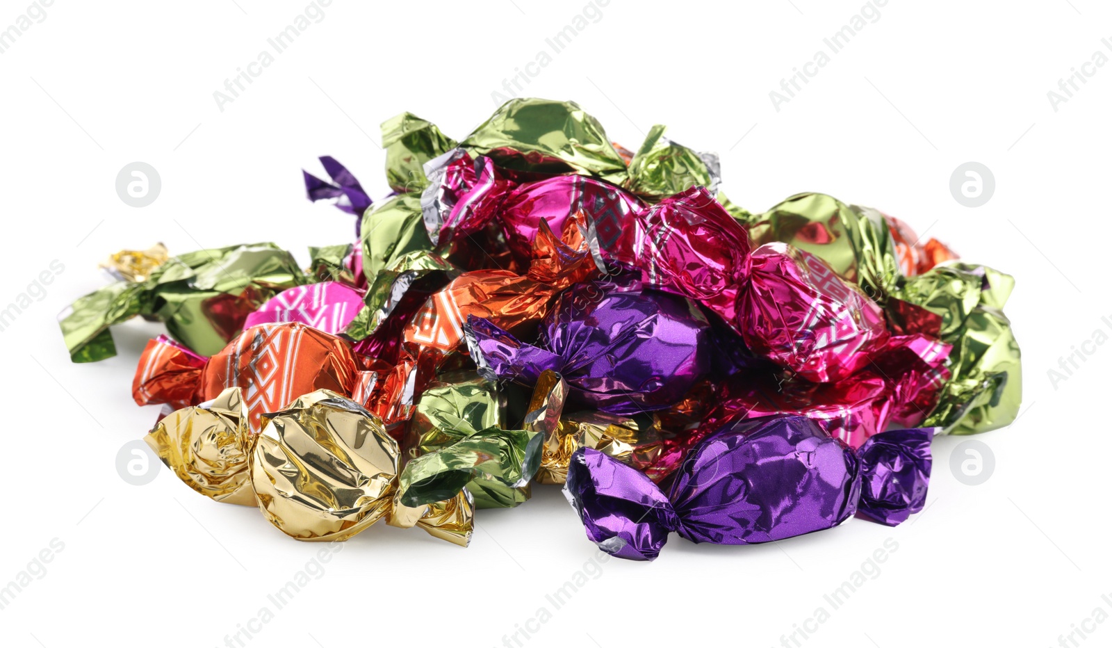 Photo of Candies in colorful wrappers isolated on white