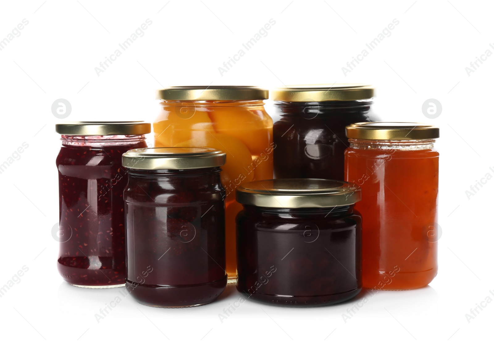 Photo of Glass jars with different pickled fruits and jams on white background