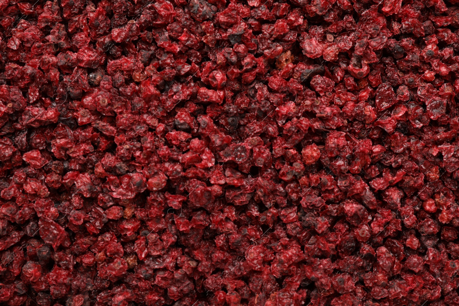 Photo of Dried red currants as background, top view