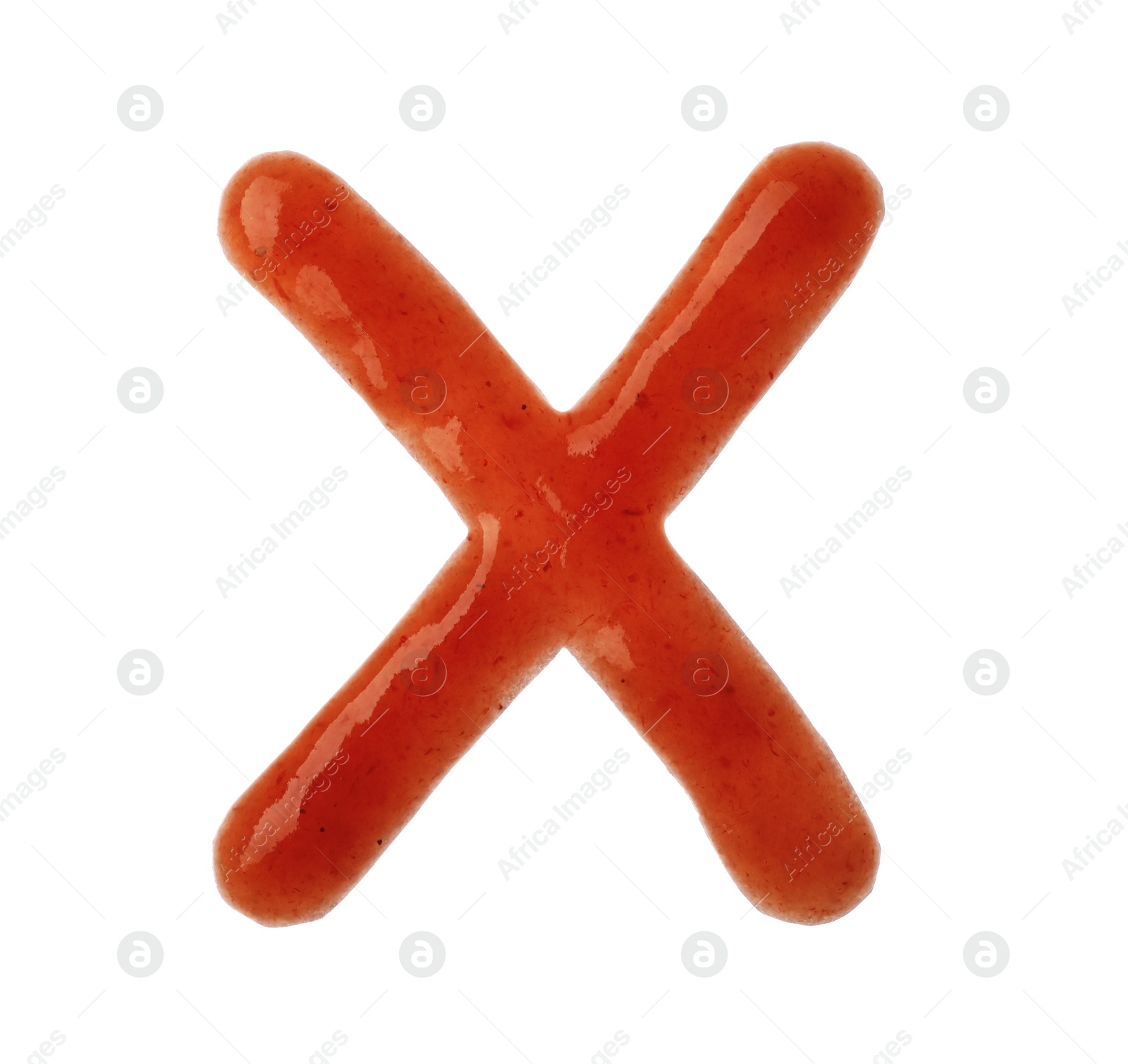 Photo of Letter X written with red sauce on white background